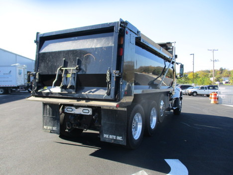 USED 2022 VOLVO VHD84F TRI-AXLE STEEL DUMP TRUCK #$vid